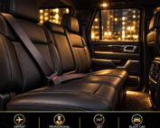 Seat belt buckled across a black leather passenger seat inside a chauffeured vehicle.